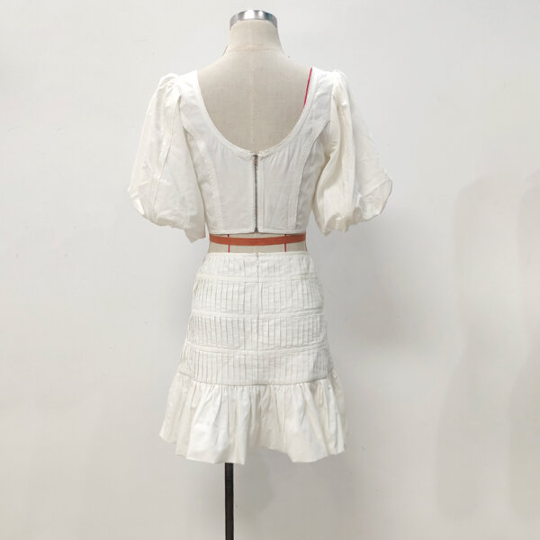 white top and mini skirt tow piece set